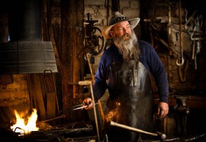 heating the iron in the forge
