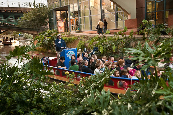 boat ride giving tours on the riverwalk