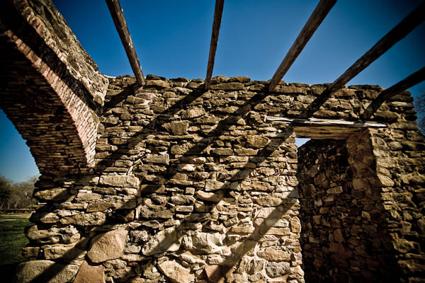 shadows across wall from roof